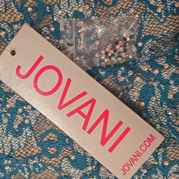 Brand new Jovani teal gown. Never worn!! Stunning detail !! Beautiful train!! - Picture 8 of 13